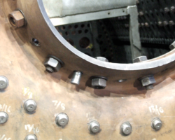 Also soon to be final riveted is the firehole door, with some bolts removed to reveal the holes.