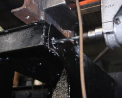 Now the hole can be safely drilled and a suitable domed head bolt fitted once all the swarf has been cleared.