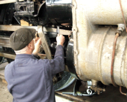 With the right piston on the front quarter, Graham marks the position of the crosshead.