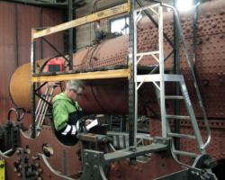The reason these items would soon be needed was that the boiler this day was given its hydraulic test, and they will be needed for the following steam test. The boiler inspector, Andy, consults his notes.