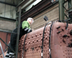 Andy ensures that the required pressure is reached and held.