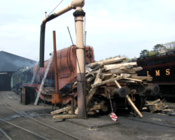 Given the price of coal, the fire is built up, initially at least, from scrap wood.