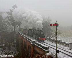 Sunday 3rd December 2023. With a light covering of festive snow. 2968 passes Oldbury viaduct leaving Bridgnorth at the head of the Enchanted Express. Credit: Kieran Hardy